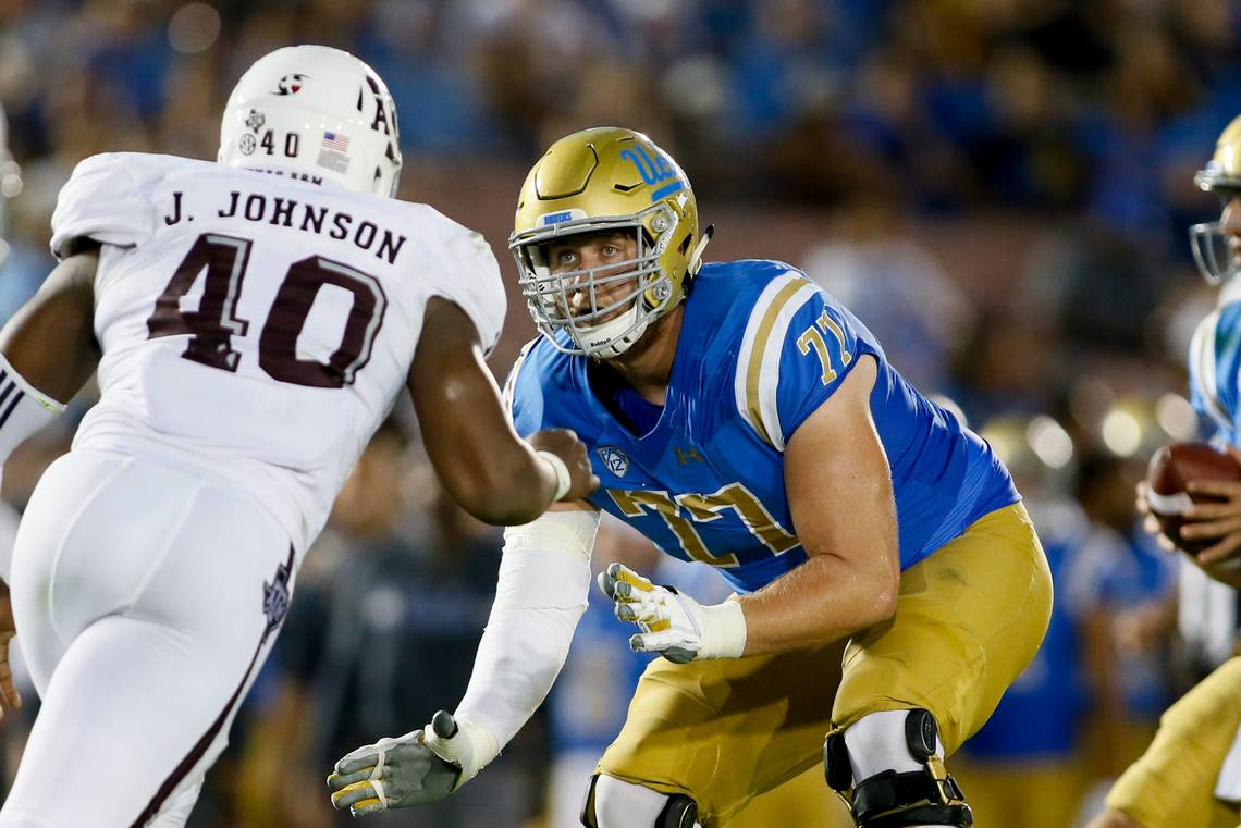 Kolton Miller blocks during a UCLA football game.